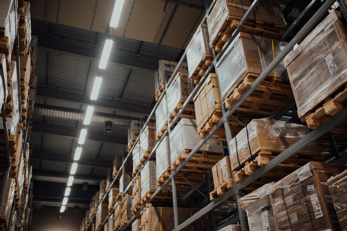 Product sourcing and warehouse logistics Stocked warehouse shelves supporting product sourcing and supply